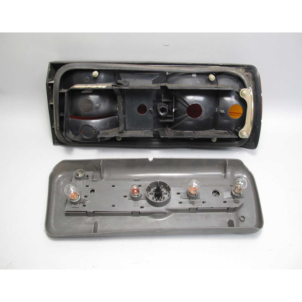 BMW E30 3-Series Late Model Left Rear Drivers Tail Light Lamp Housing w Tray OEM